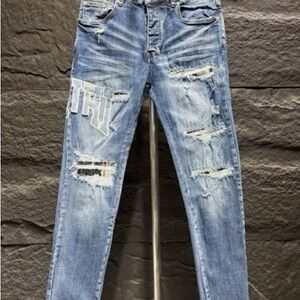 AMIRI Light Blue Distressed Skinny Jeans